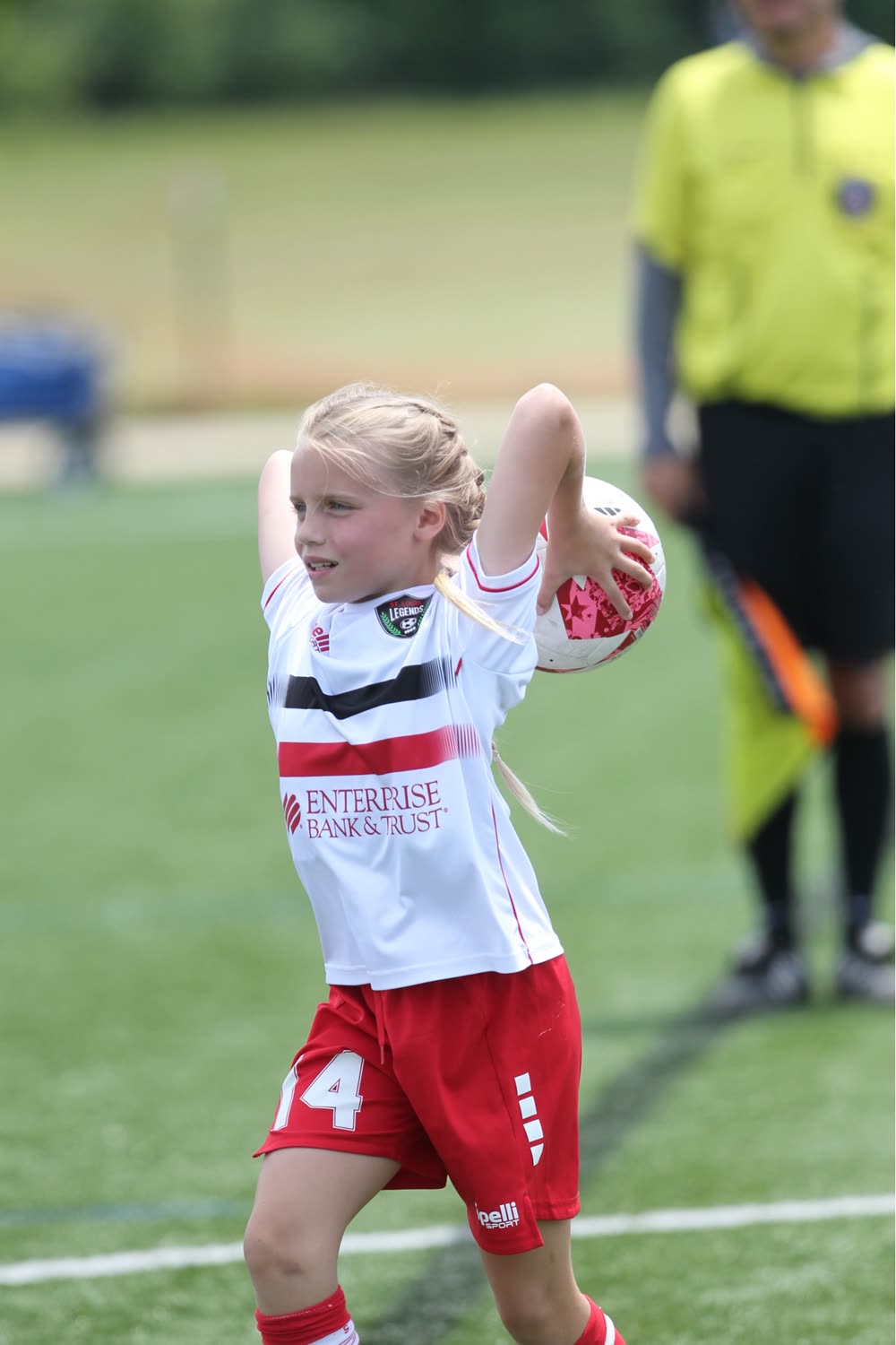A St. Louis Legends player prepares to take a throw-in during a match